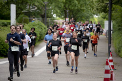 Runners jog across the campus
