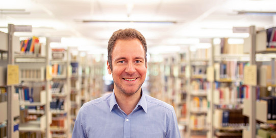 picture of a man in a library
