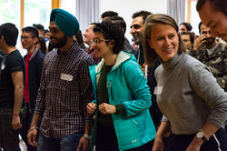 A group of dancing international students at the IBZ