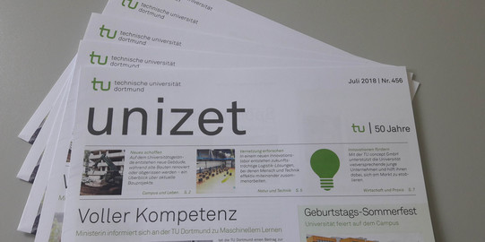unizet Several copies of an issue of the unizet newspaper lie fanned out on a table