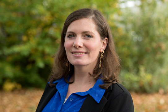 Portrait of Prof. Aude Zingraff-Hamed: Prof. Zingraff-Hamed is wearing a blue blouse, a dark jacket, and gold earrings.