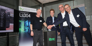 Photo: Several people ceremonially inaugurate the LiDO4 high-performance computer at TU Dortmund University.