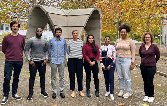 Photo: A group photo of the International Student Council on the fall campus of TU Dortmund University.