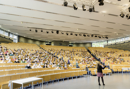 A large lecture hall filled with students.