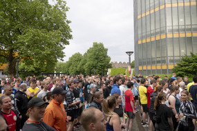 Many runners gather at the starting line.