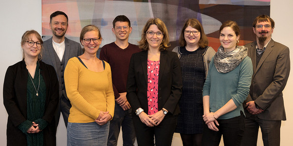 A photo of seven of the ten funded scientists and Dr. Peters.