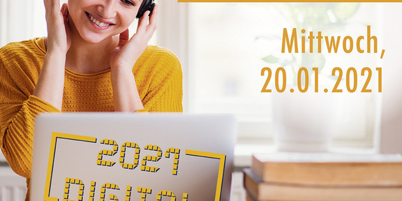 Eine Frau schaut auf einen Laptop und hat Kopfhörer auf