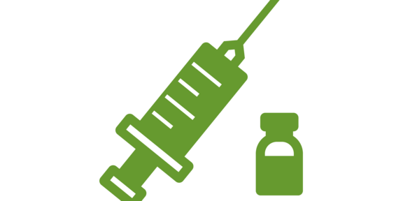 Eine grüne Spritze und Impfstoff