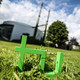 TU logo on the lawn. In the background the Audimax.