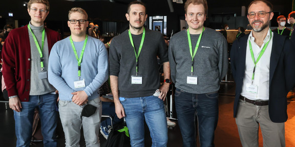 Working group Group photo of five men.
