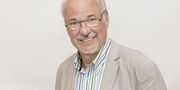 Portrait of a man on white background. The man is Prof. Engell.