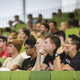 People are sitting in a lecture hall