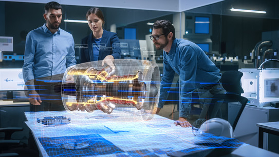 Two men and a woman look at a simulation of an aircraft engine.