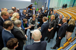 Audimax Eine Gruppe Menschen im Audimax