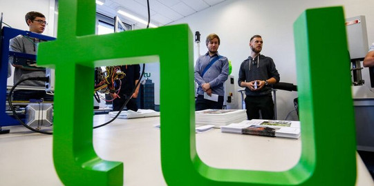 Das grüne TU Dortmund Logo wird dargestellt