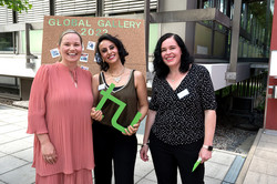 Group photo of three women with TU logo