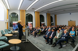 Guests sit in rows at the opening of Research Alliance Ruhr.