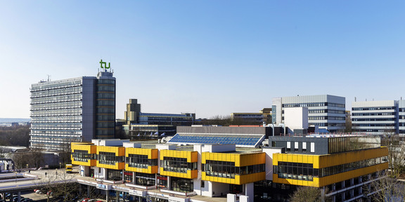The picture shows in a panorama several buildings of the Campus North of the TU Dortmund University