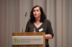 Woman at lectern