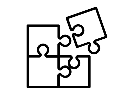 Ein Puzzlestück wird in ein Puzzle eingesetzt