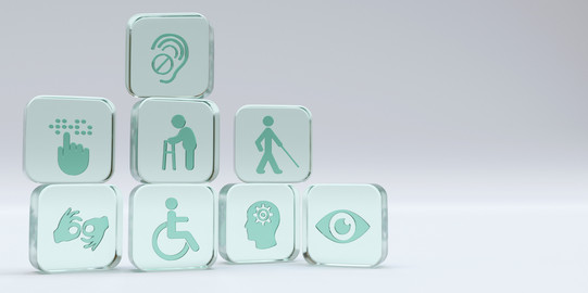 Seven turquoise cubes displaying disability and accessibility symbols, including an ear with hearing aid, person with walker, person with white cane, sign language, wheelchair, head with gear, and an eye. 3D Rendering. 