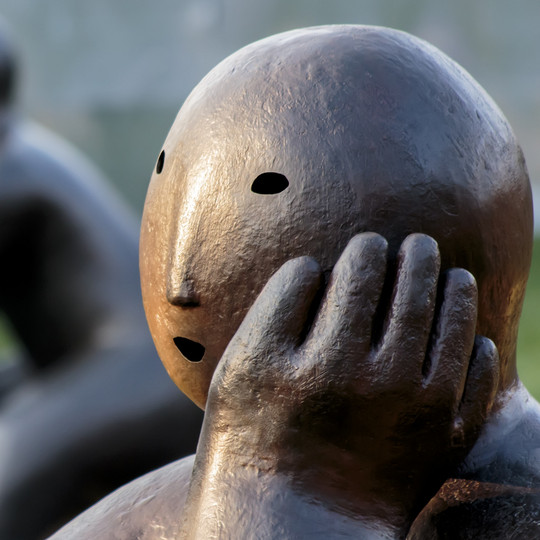 Sculpture of a thinking person