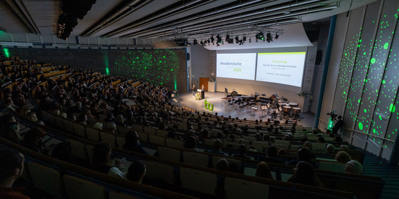 The Audimax is full of people at TU Dortmund University's annual academic celebration.