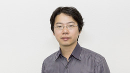 Portrait photo of man with glasses