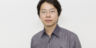 Chen Portrait photo of man with glasses