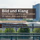 Hintergrundbild ist die Skyline von Dortmund, Fokus ist der Kirchturm der Reinoldikirche. Schrift vor dem Bild: "Bild und Klang. Wenn Bilder und Klänge erzählen. 20 Jahre Bild und Klang. Wintersemester 2025/2026. Öffentliche Vorlesungsreihe mit Musikvorführungen in der Stadtkirche Sankt Reinoldi."