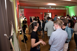 People in conversation at the Gallery Walk