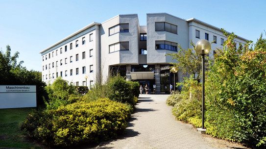White three-storey building of the Department of Mechanical Engineering