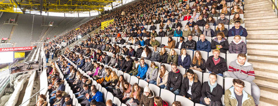 Welcoming event for freshmen Stands of Signal-Iduna-Park with freshman students.
