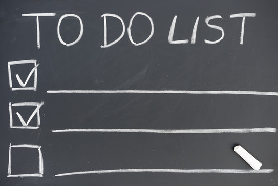 The title "To Do List" is written on a black board.