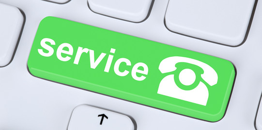 telephone service A white keyboard with one green key. A telephone and the word „service“ are printed on it