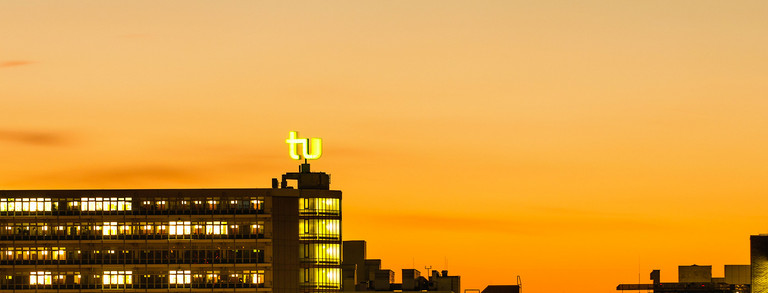 Skyline of TU Dortmund University with sunset in the background