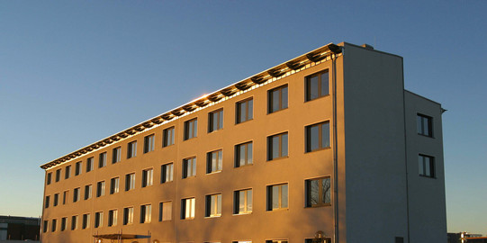 A white building in the sunset