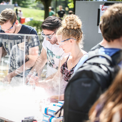 Students wearing goggles at the dry ice stand